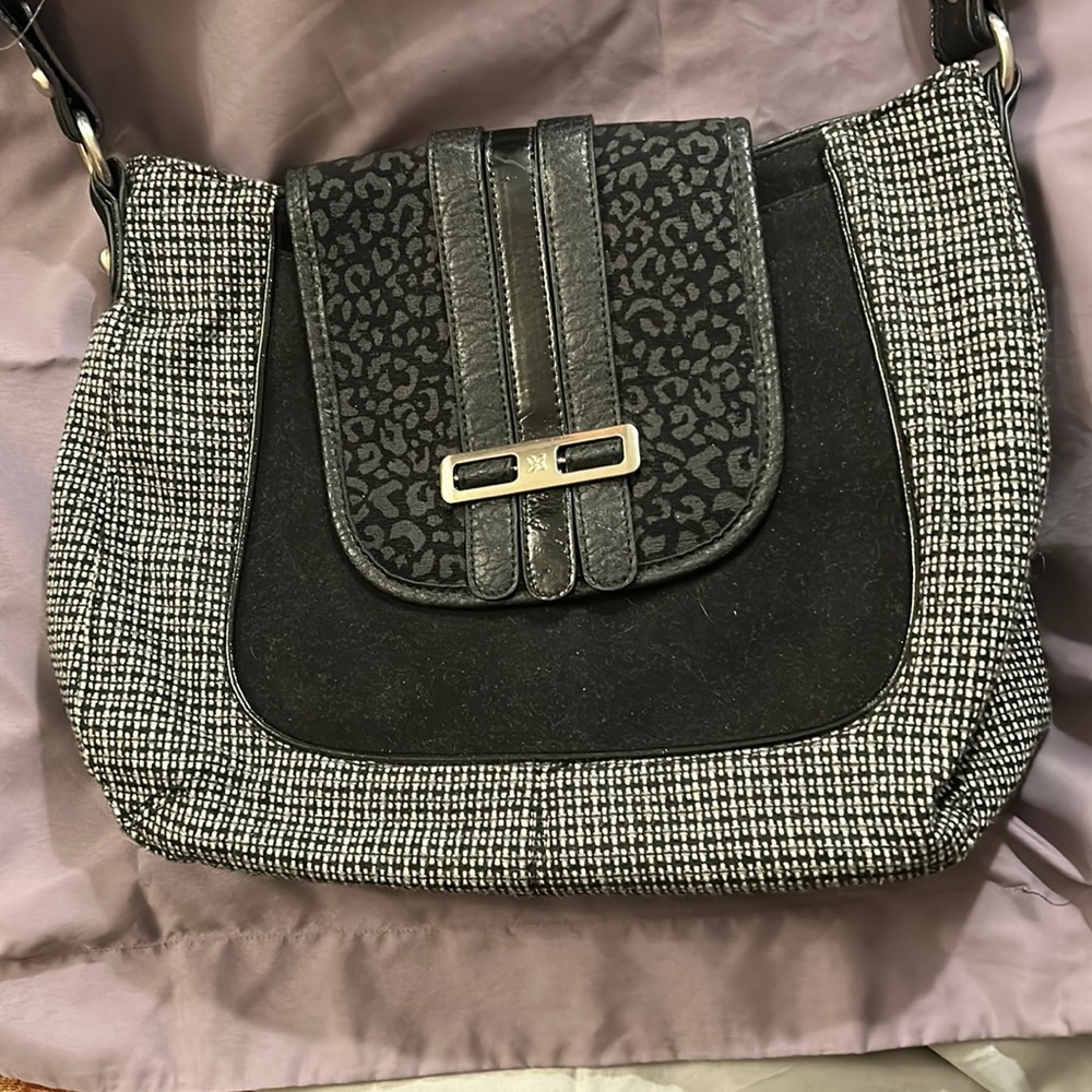 Purse black and white all man made material